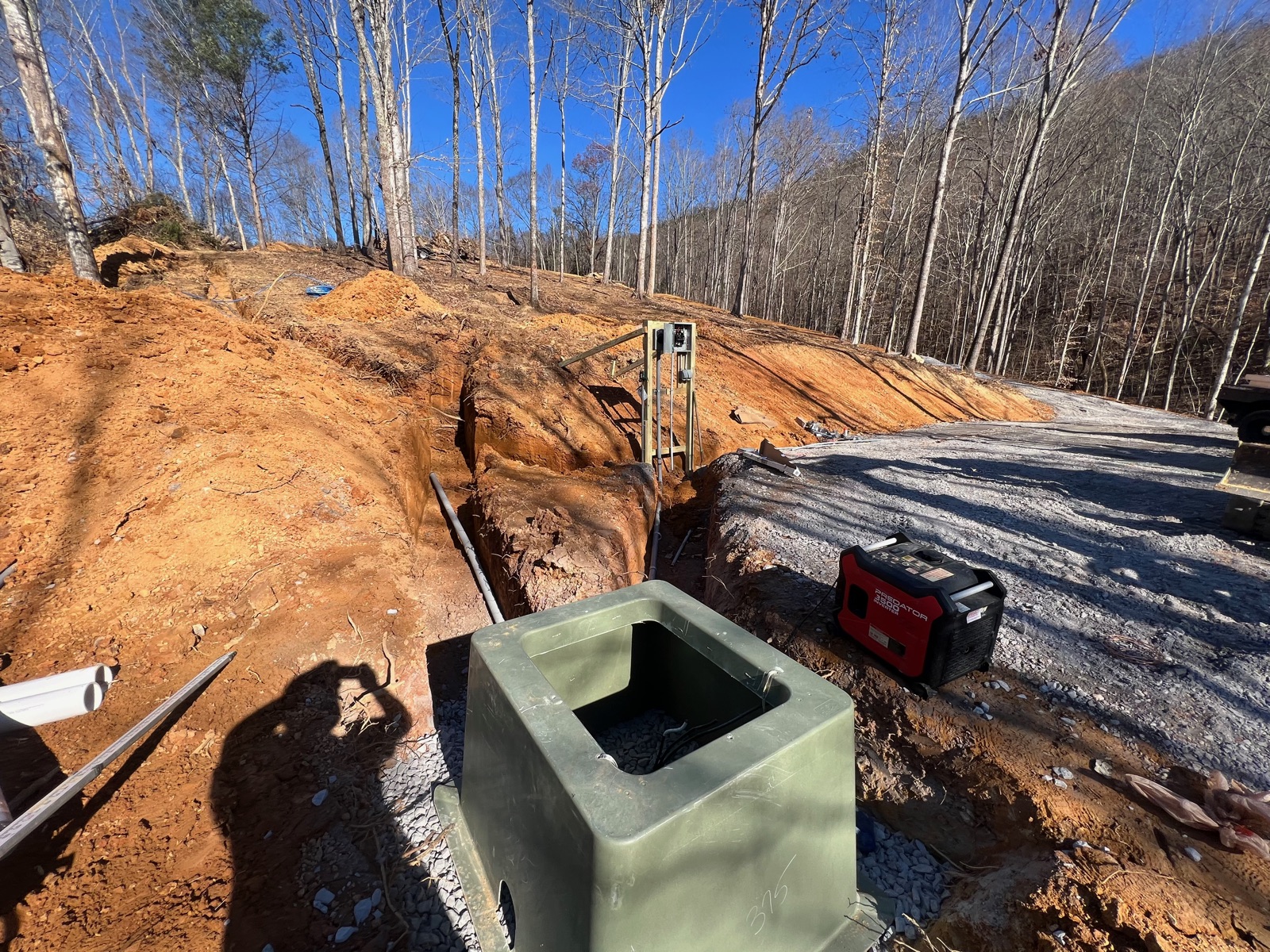 Septic distribution box installed on a hillside site