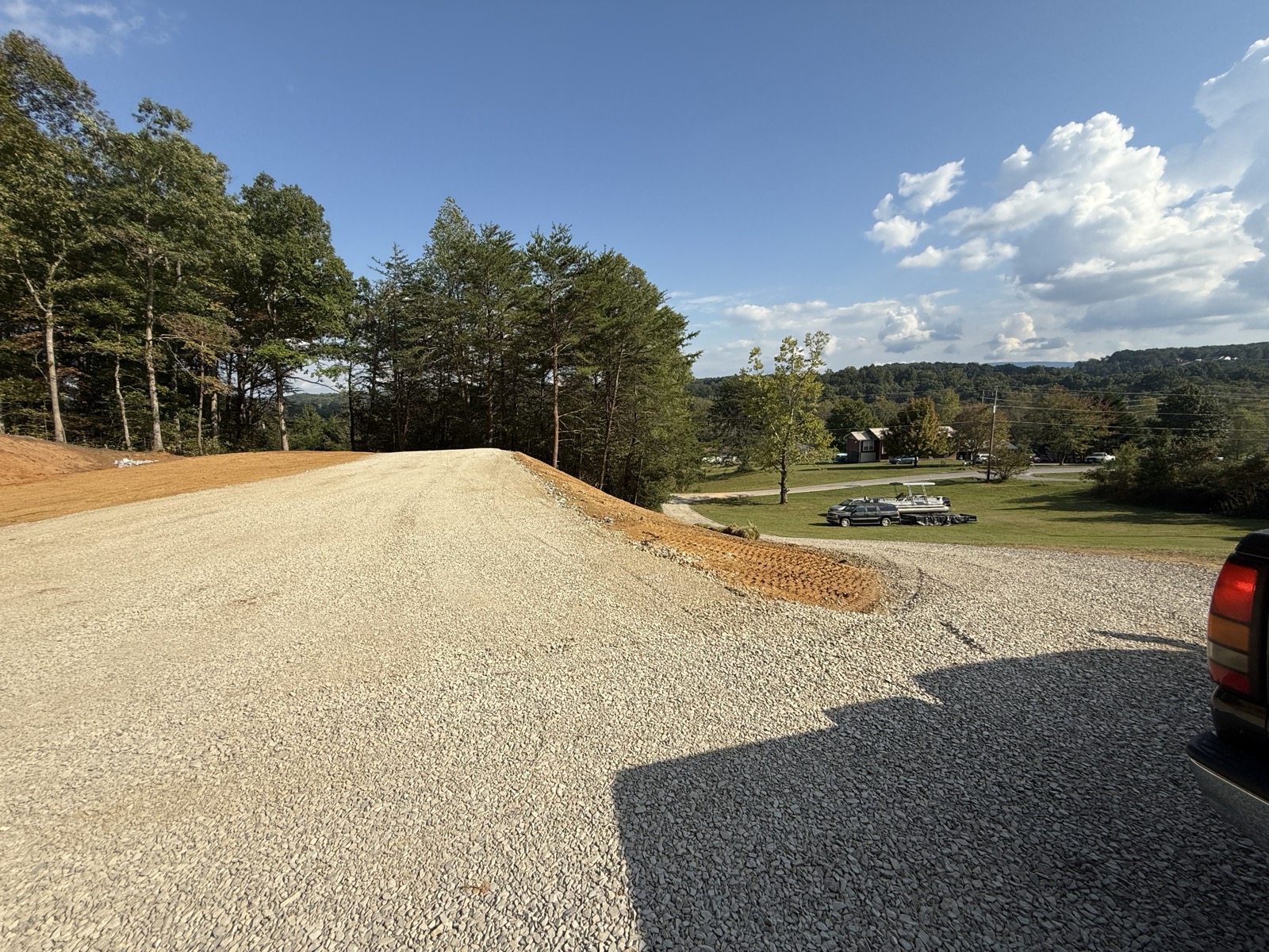 New gravel driveway with mountain views in the background