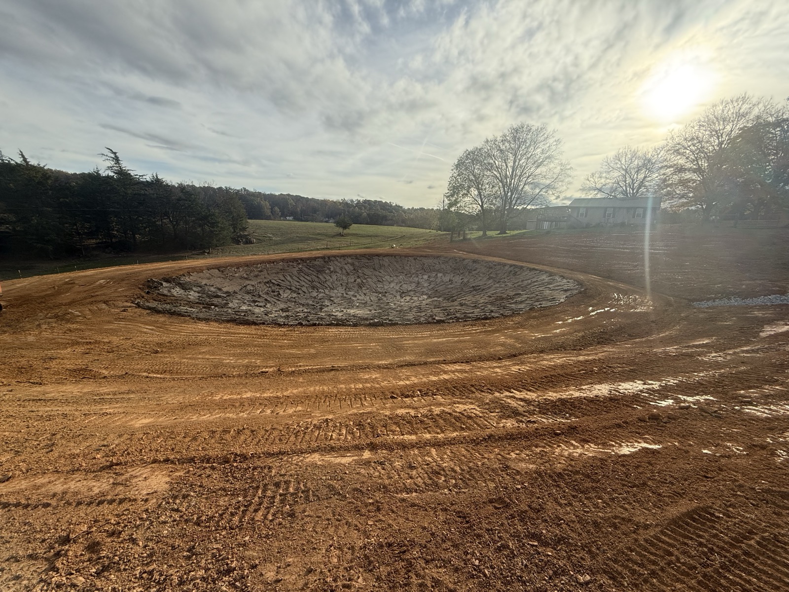 Pond construction with surrounding dirt work