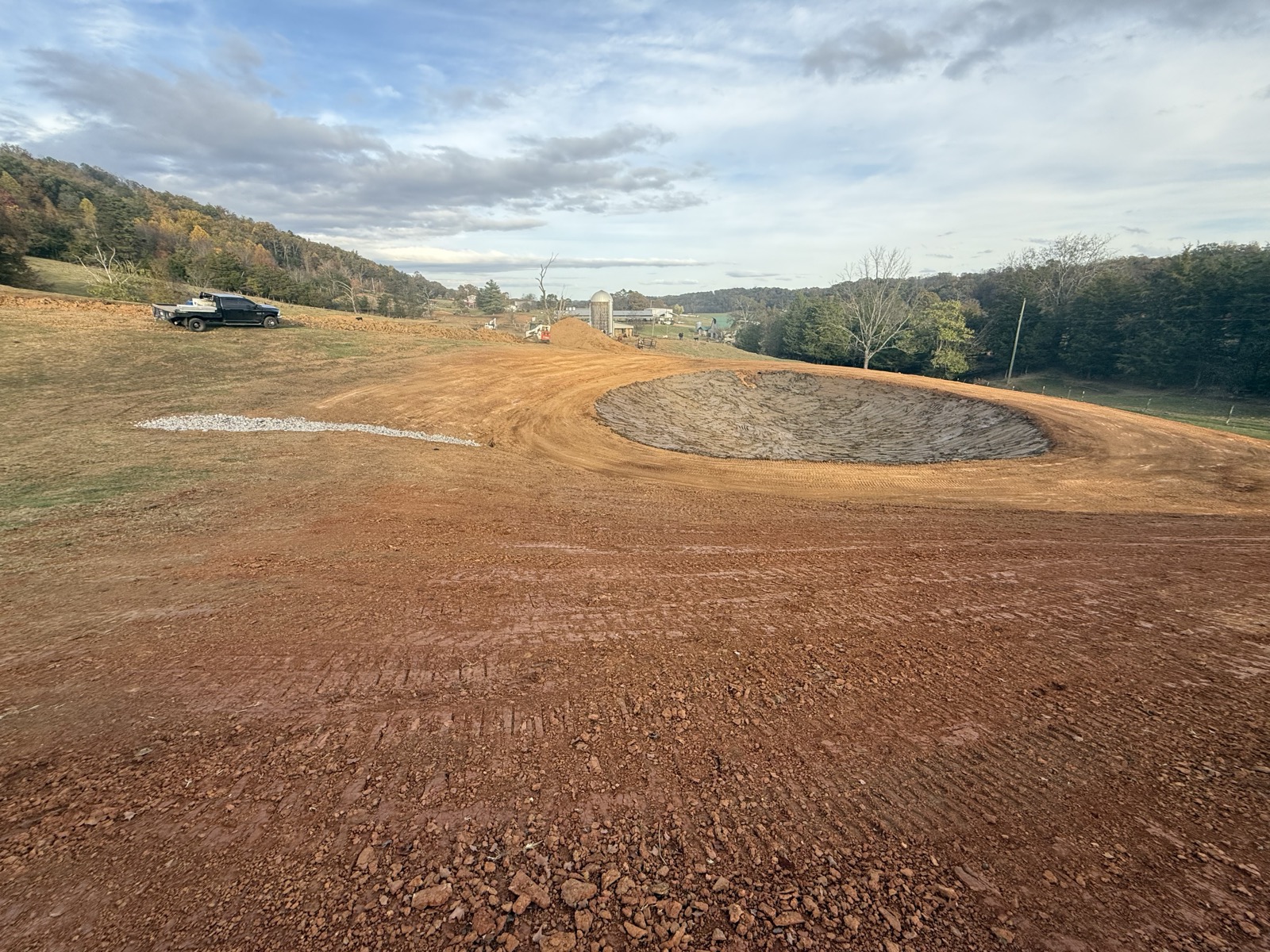 Pond basin shaped and graded ready for water